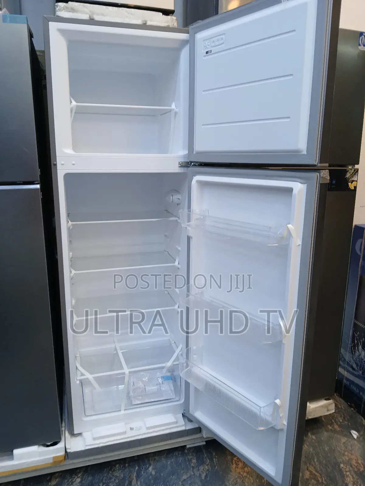 Midea Refrigerator, Likely the Midea 414 Model.1