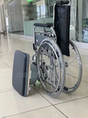 Wheelchair With a Built-in Commode, Designed for Patients