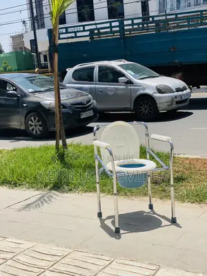 Foldable Commode Chair | Adjustable Height, Lightweight Bedside Toilet