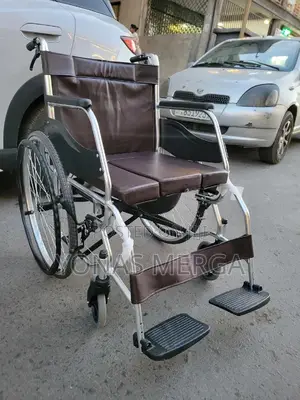 Wheelchair/Both a Mobility Aid a Toilet Chair, Enhancing Ease of Care.