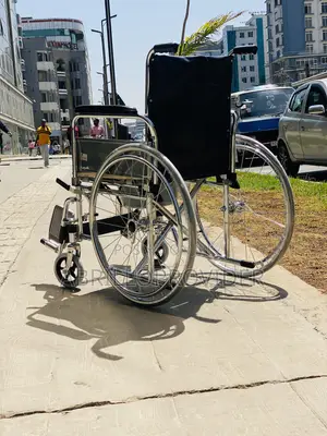 Wheelchair With Head And For A Patient Or An Elderly. With Commode