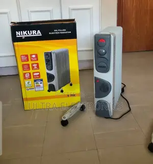 Nikura 9-Fin Oil Filled Electric Radiator. Type: Oil-Filled Electric