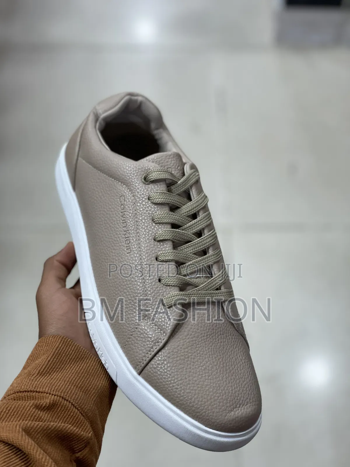 Calvin Klein in Beige: Clean and Classic