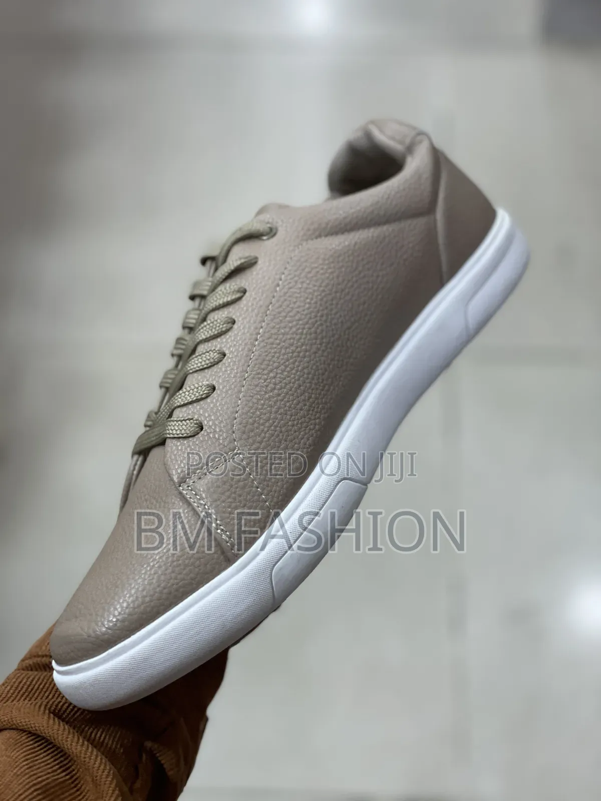 Calvin Klein in Beige: Clean and Classic