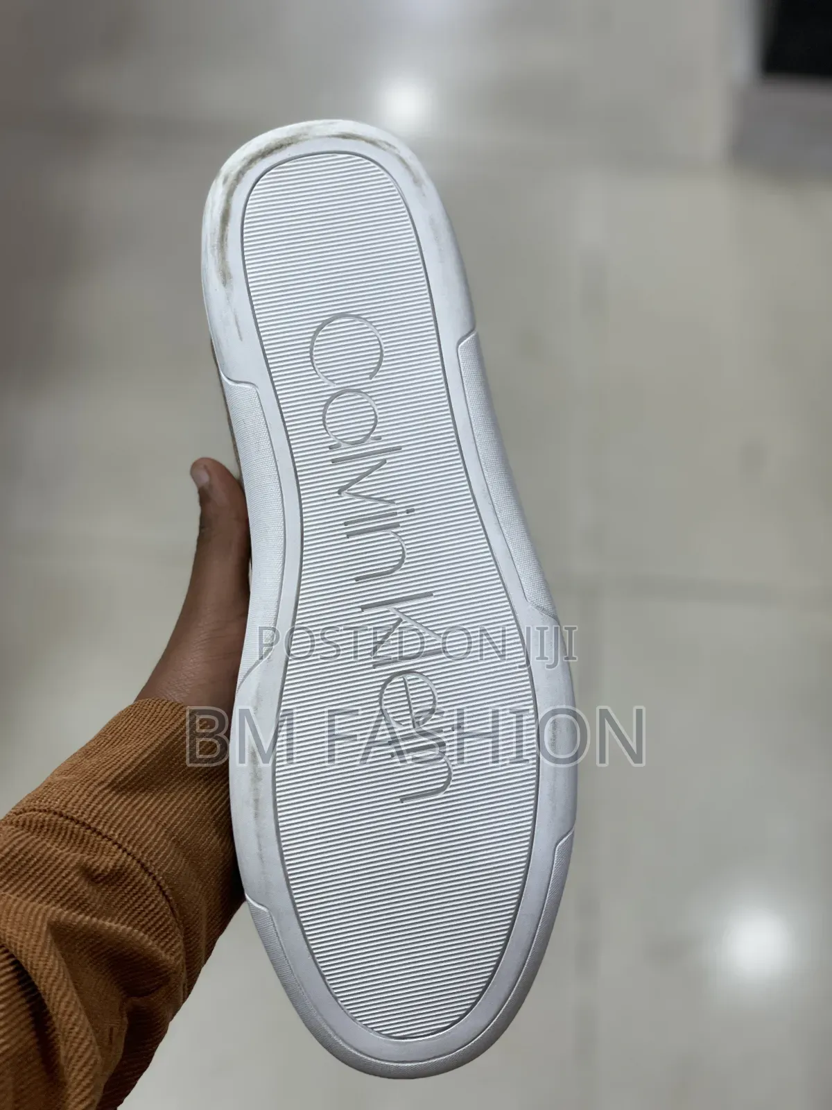 Calvin Klein in Beige: Clean and Classic