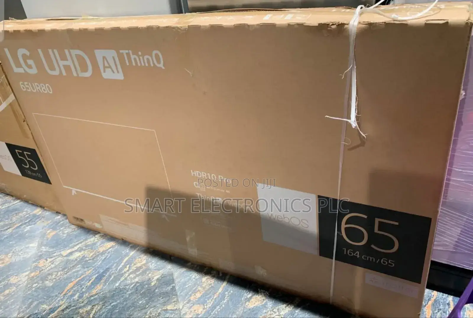 Lg 65 Inch Boxed Lg 65ur80 Uhd Smart Tv, Featuring a 65-Inch Display.