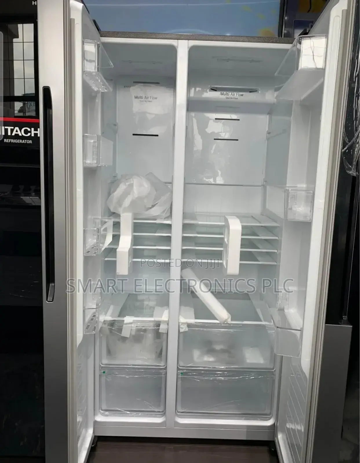 Lg Side-by-Side Refrigerator, Likely a 566-Liter or Similar Capacity