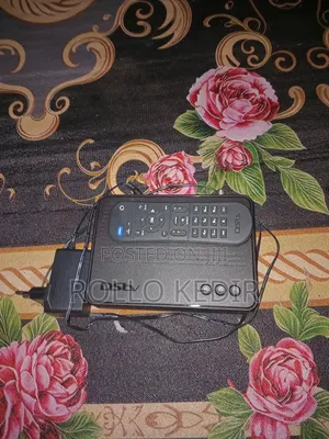 “Unused DSTV Decoder – Works Perfectly + Remote Cables”
