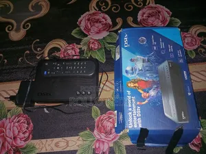 “Unused DSTV Decoder – Works Perfectly + Remote Cables”