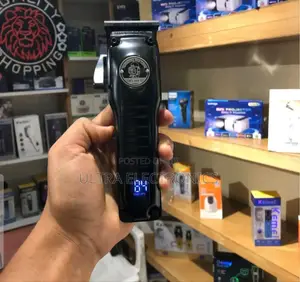 Kemei Km-1827 Professional Cordless Hair Clipper and Trimmer. It