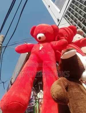 Red Long-Legged Oversized Stuffed Animal With Gold Ribbon