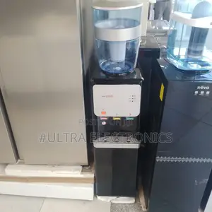 Top Media Top-Loading Water Dispenser Available in Black.