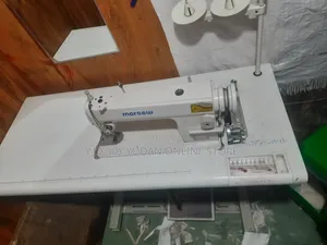 የስፌት ማሽን Sewing Machine