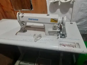 የስፌት ማሽን Sewing Machine