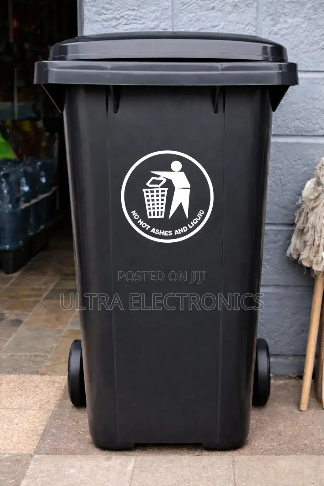 Black Plastic Wheelie Bin, Commonly for Outdoor Waste Collection