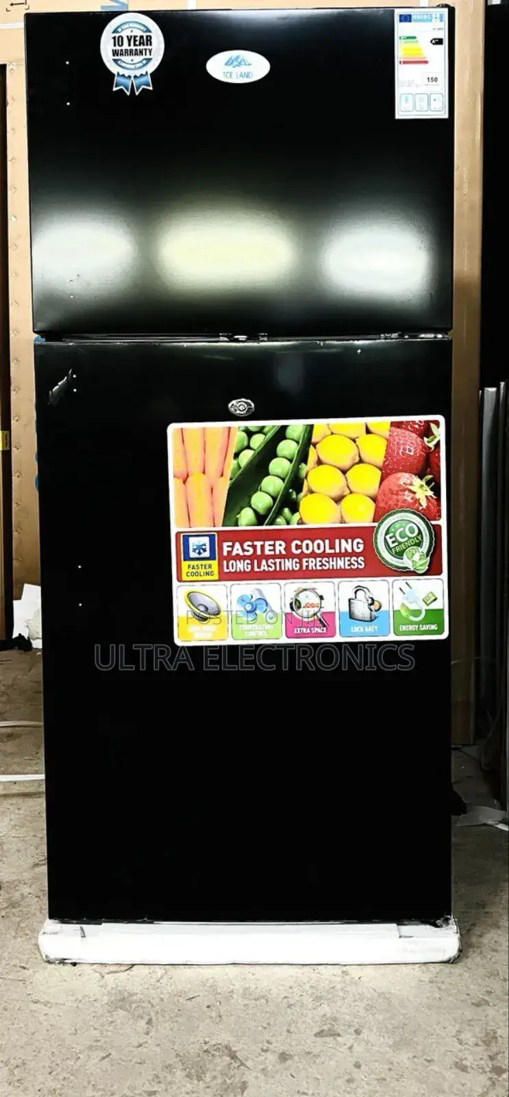 Iceland Brand Top-Freezer Refrigerator, Likely Model 210 or a Similar