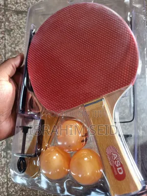Tennis Racket With Balls and Net