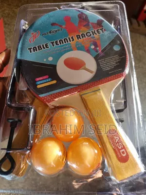 Tennis Racket With Balls and Net