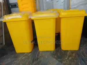 Garbage Yellow Industrial Wheeled Waste Container, Often as a Medical
