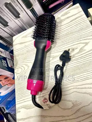 Hair Dryer and Volumizer Hot Air Brush. This Is a Popular 2-in-1 የፀጉር