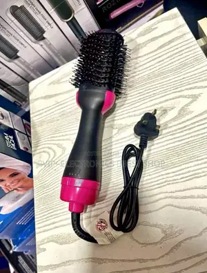 Hair Dryer and Volumizer Hot Air Brush. This Is a Popular 2-in-1 የፀጉር