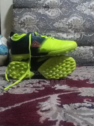 Football or Soccer Shoes (Cleats/Boots)