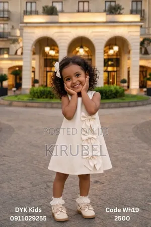 Elegant Cream Girls Dress With Bow Detail