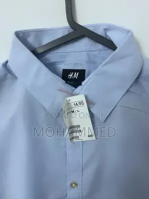 H M Light Blue Shirt ሽሚዝ
