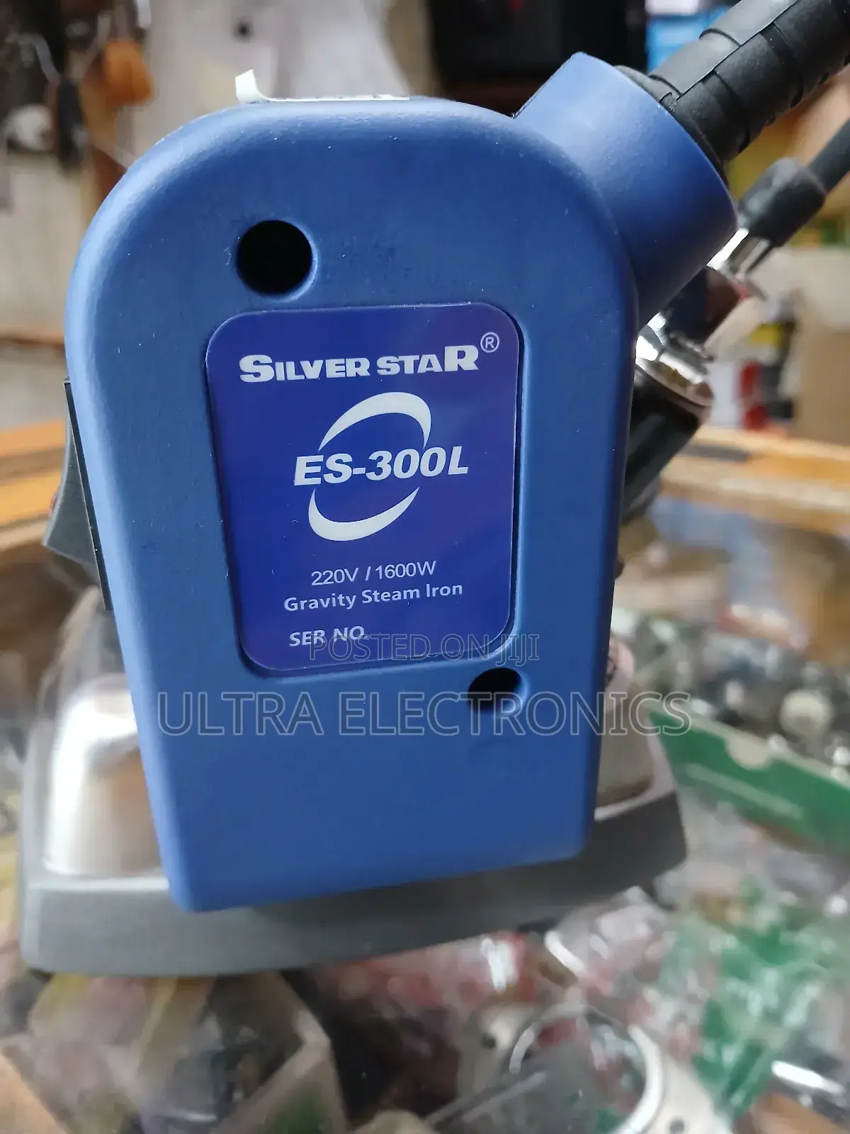 Silver Star Es-300 Gravity Feed Steam Iron. It Operates at 220 Volts