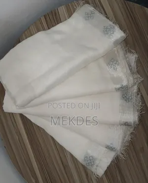 የመቁረቢያና የማስቀደሻ ነጭ ነጠላ