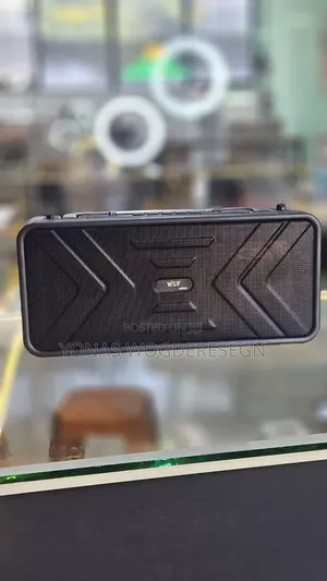 Wuf Portable Speaker and Fm