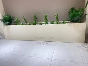 Flower Coat አበባ ማቀመጫ