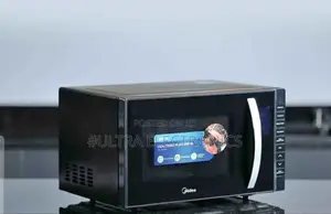 Midea Microwave Oven, Likely a 23l Model Featuring a Grill Function,