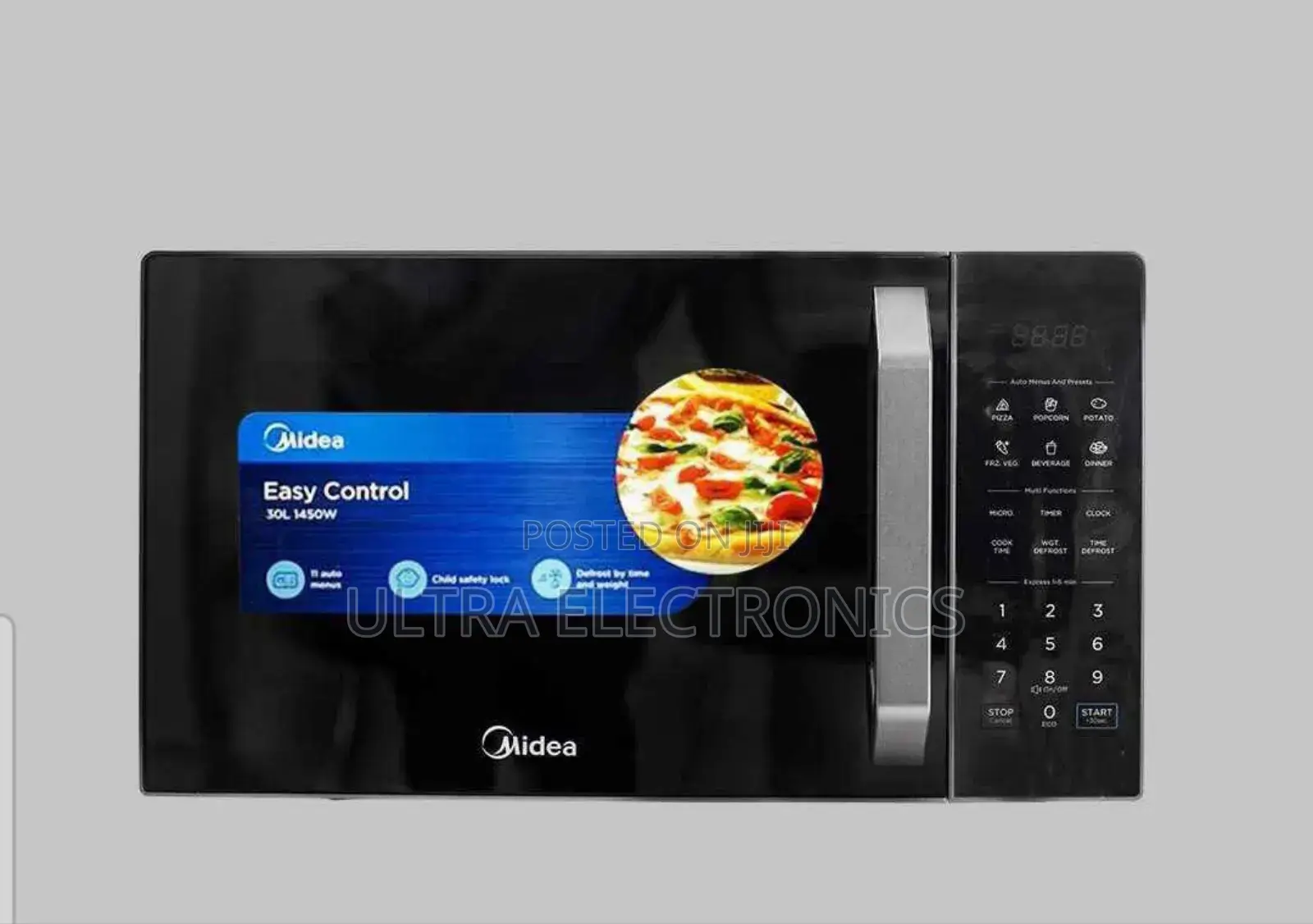Midea Microwave Oven, Likely a 23l Model Featuring a Grill Function,