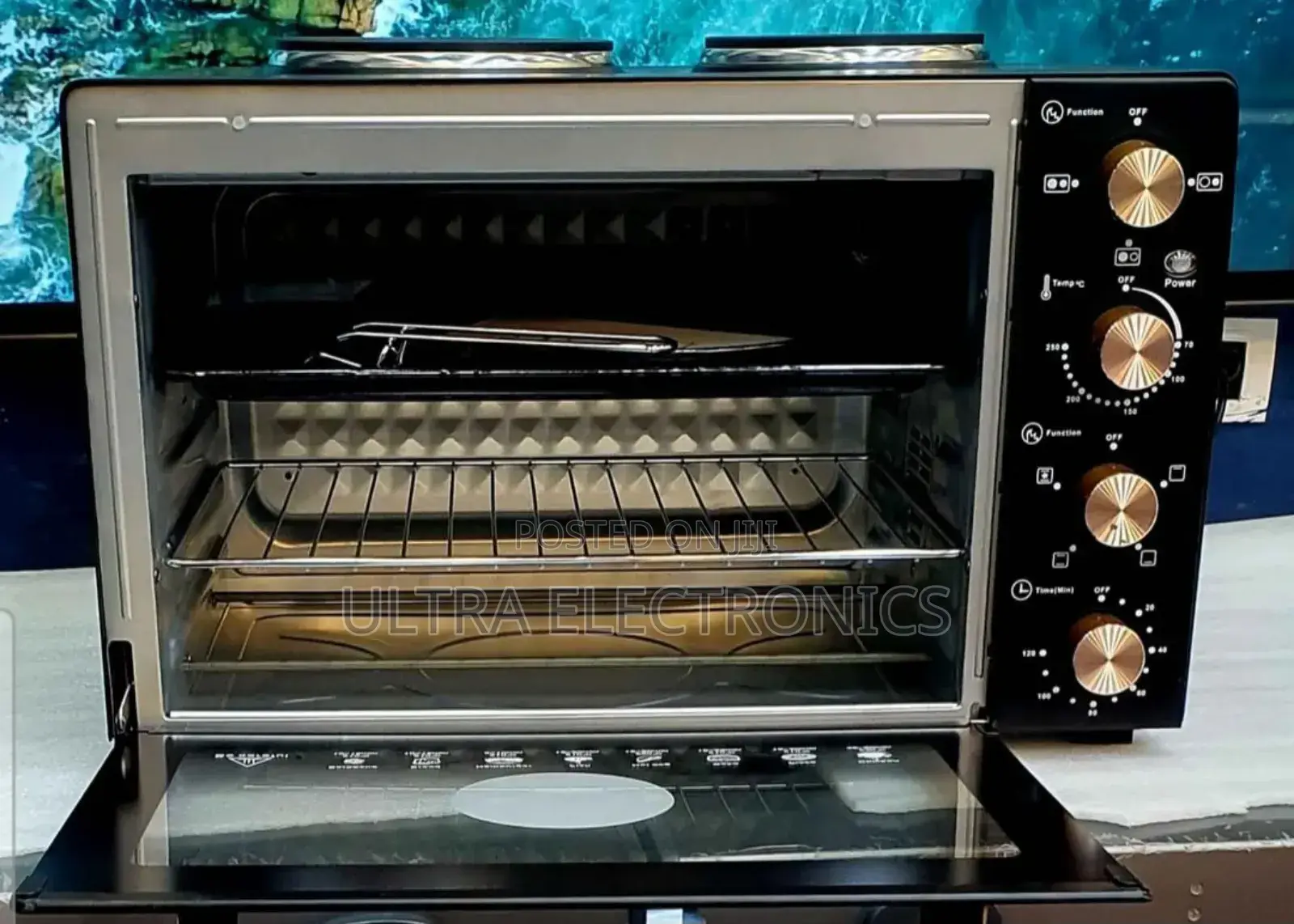 Lux Mini Oven With Two Hot Plates. Capacity: Typically Ranges