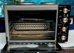 Lux Mini Oven With Two Hot Plates. Capacity: Typically Ranges