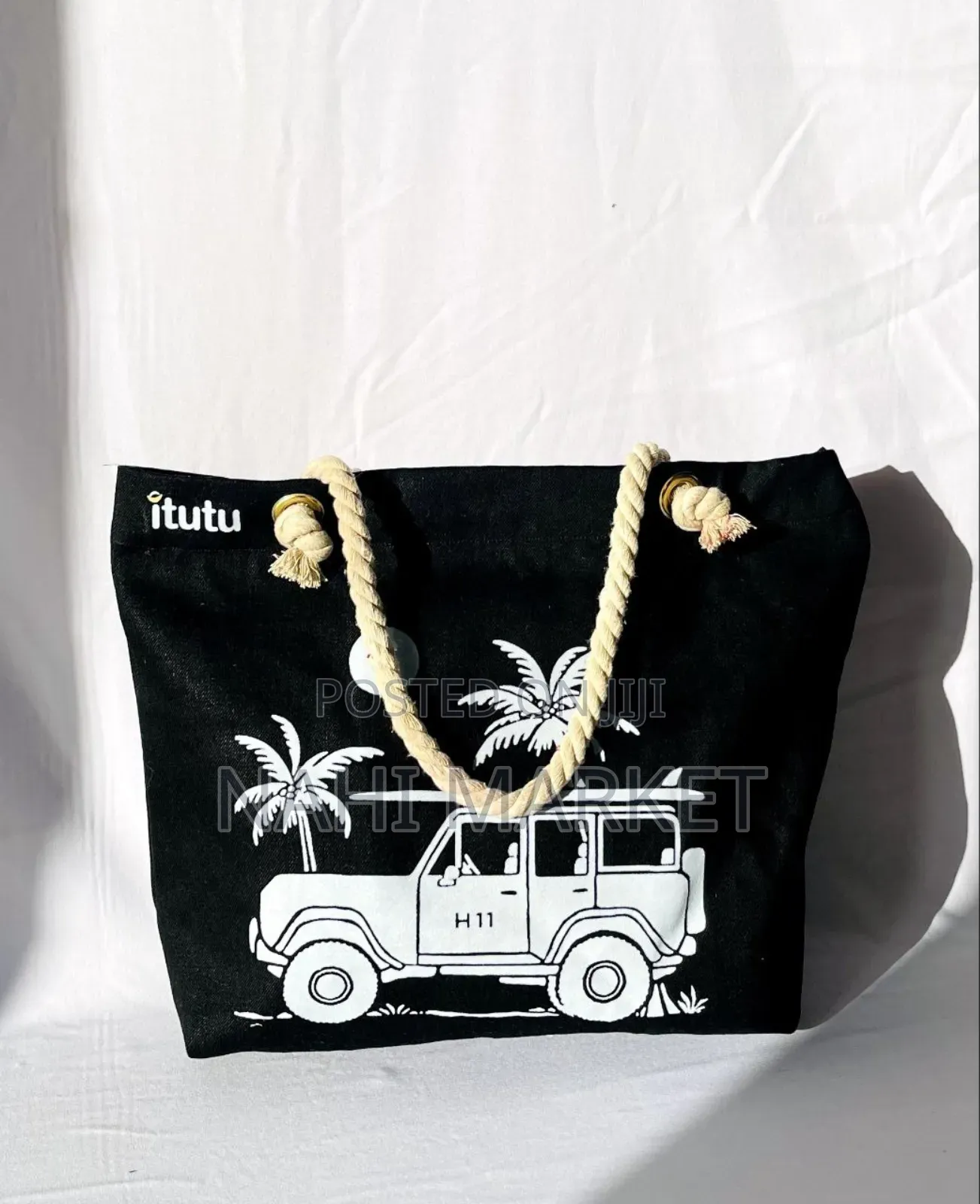 Nahi Tote Bags