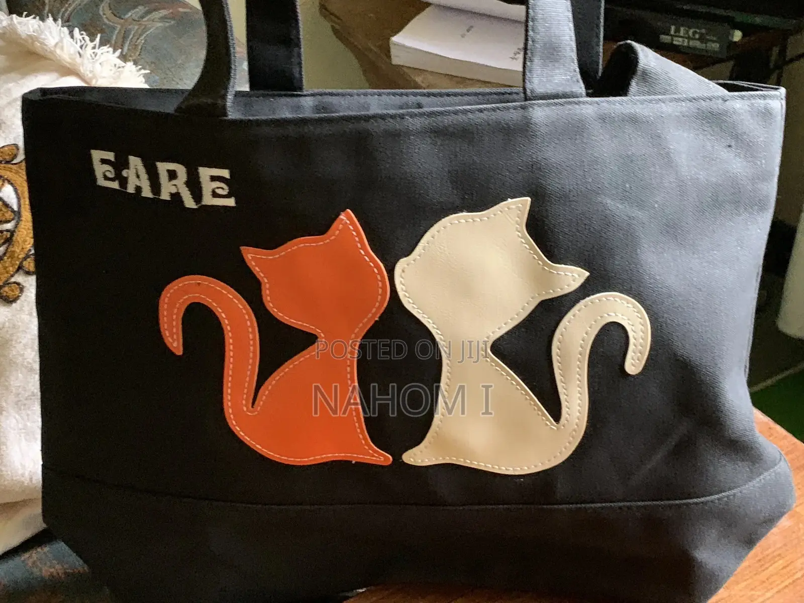 Black Canvas Tote Bag Features Decorative Cat-Shaped Appliques
