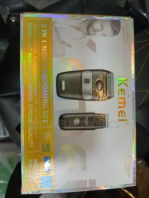 Kemei Km-165 2-in-1 Men's Grooming Kit. It Is a Rechargeable