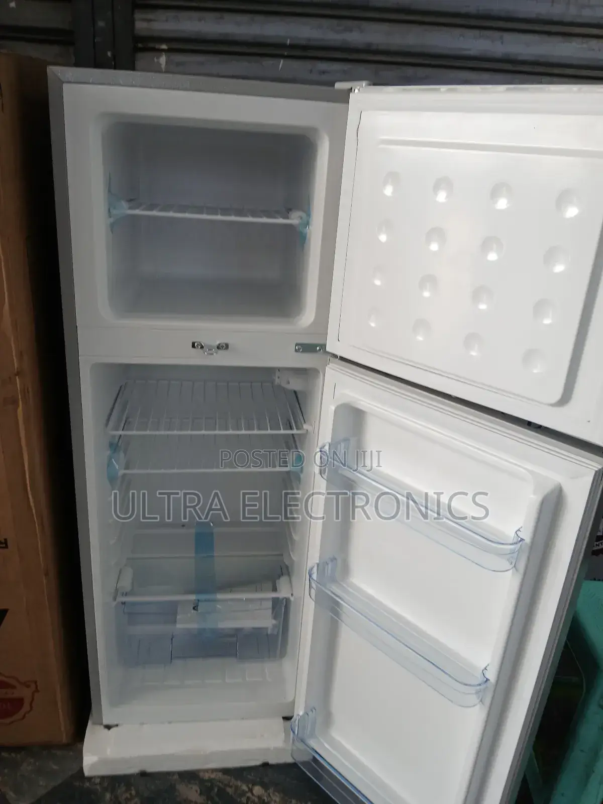 Aucma Brand Refrigerator, Specifically a Double-Door Model