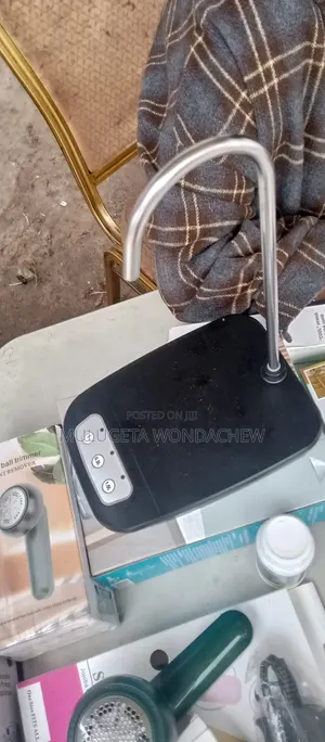 የዉሃ መቅጃ Automatic Water Dispensar