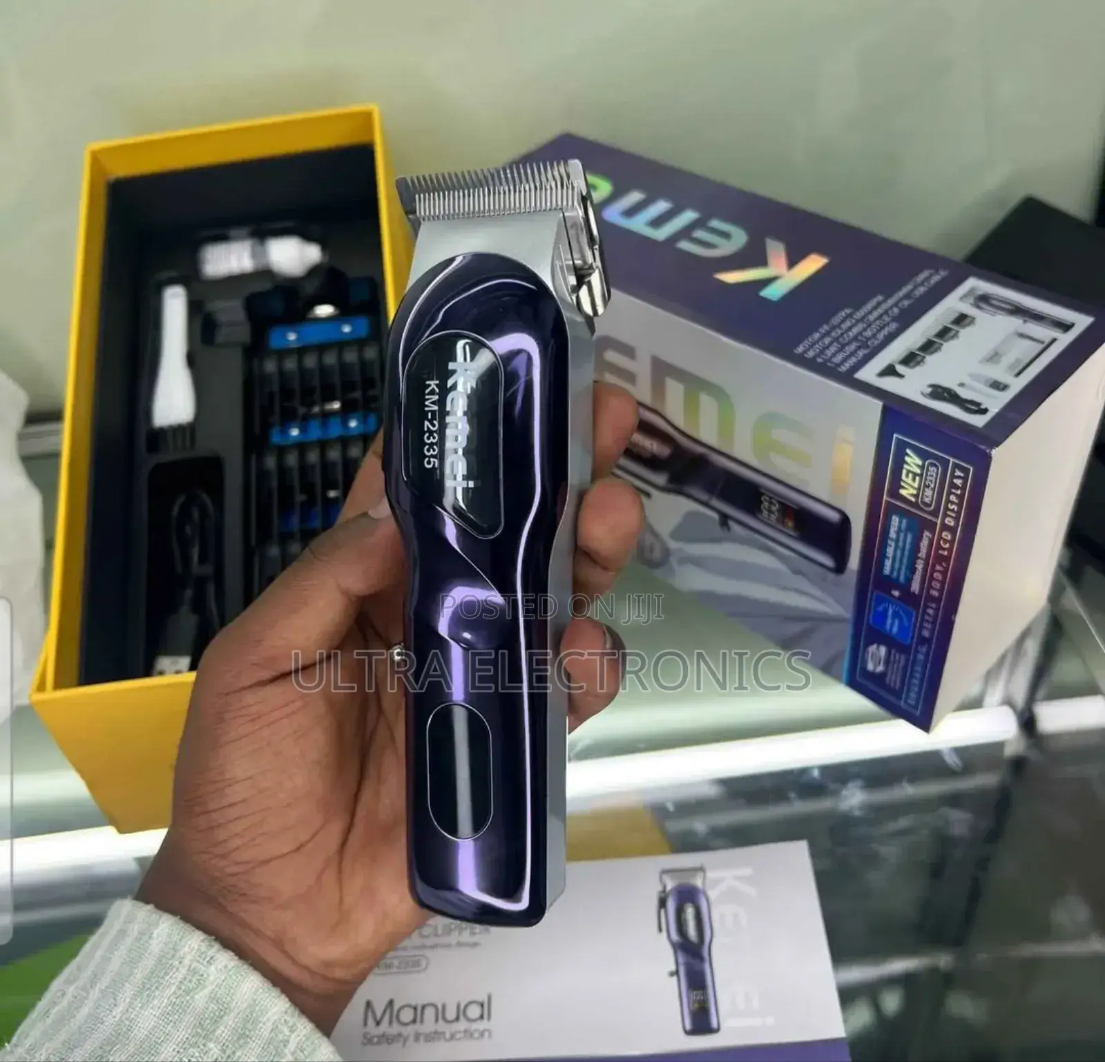 የፀጉር ማሽንkemei Km-2335 Professional Rechargeable Hair Clipper.