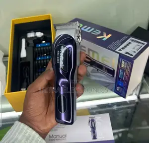 የፀጉር ማሽንkemei Km-2335 Professional Rechargeable Hair Clipper.