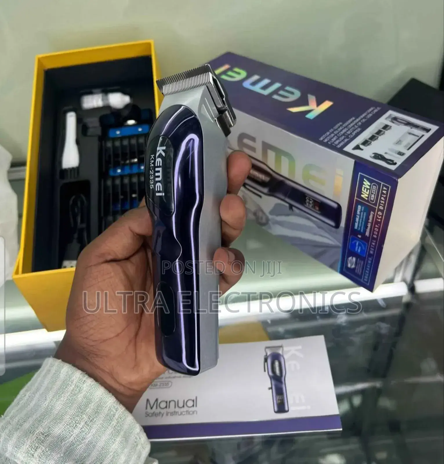 የፀጉር ማሽንkemei Km-2335 Professional Rechargeable Hair Clipper.