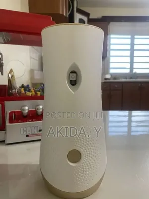 Automatic Air-freshener Sprayer Device With Spray Cans.