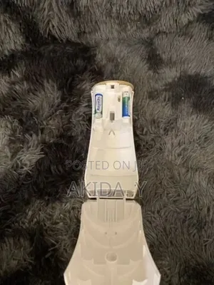 Automatic Air-freshener Sprayer Device With Spray Cans.