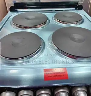 Delta Europe 4-Burner Oven Cooker, Likely a Compact Electric