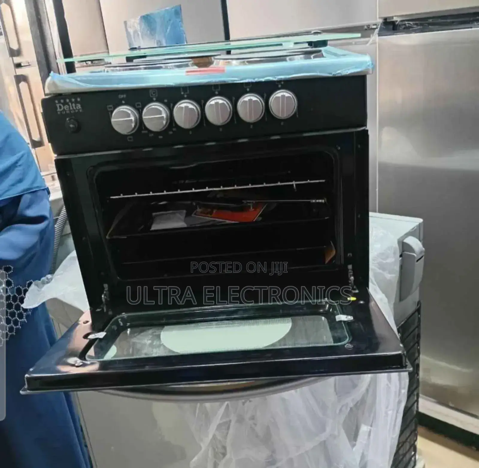 Delta Europe 4-Burner Oven Cooker, Likely a Compact Electric