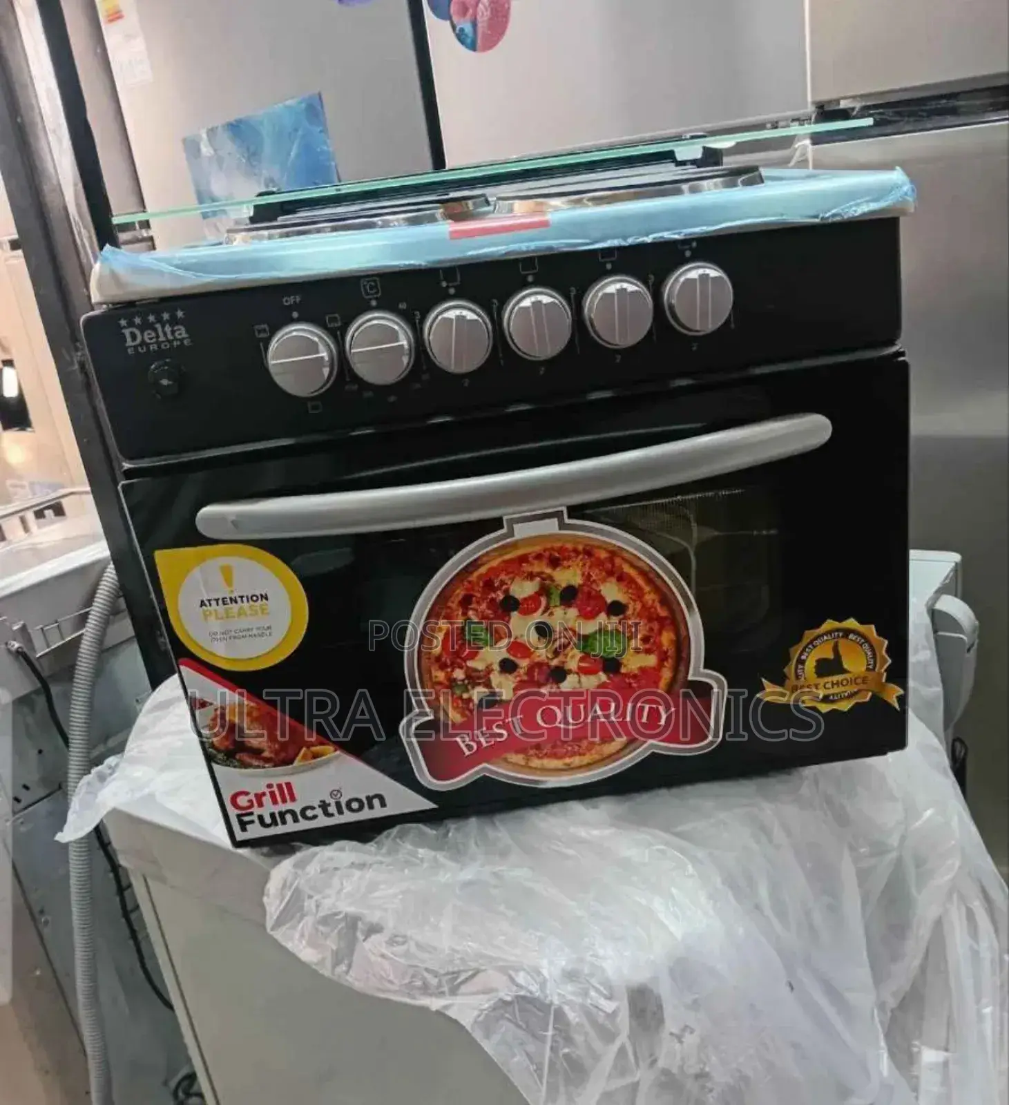 Delta Europe 4-Burner Oven Cooker, Likely a Compact Electric