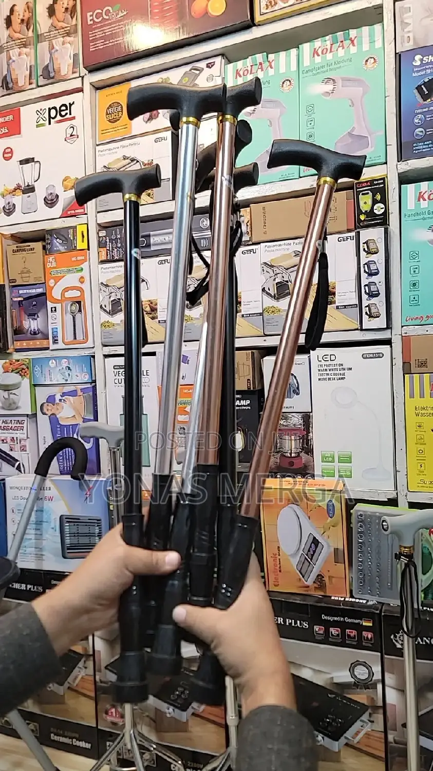Walking Cane: Compact and Retractable Bi-Fold Design